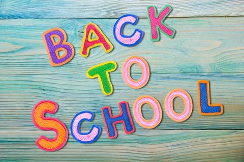 Back to School desk table top view, words on grunge old wooden board background Stock Photos