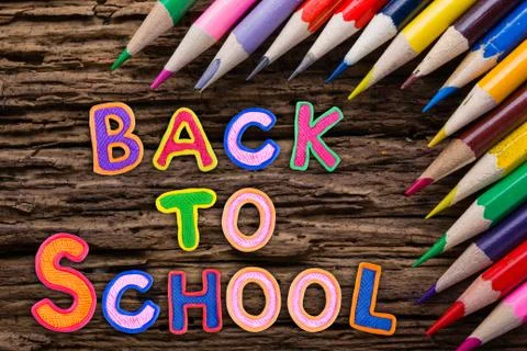 Back to School desk table top view, words on grunge old wooden board background Stock Photos