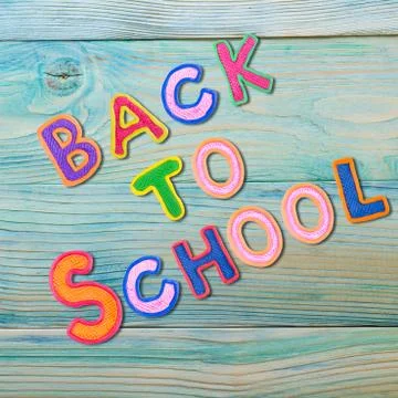 Back to School desk table top view, words on grunge old wooden board background Stock-Fotos