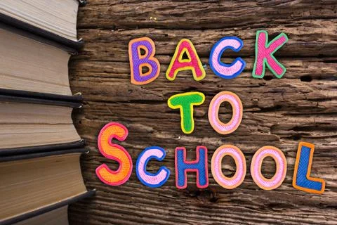 Back to School desk table top view, words on grunge old wooden board background 写真素材