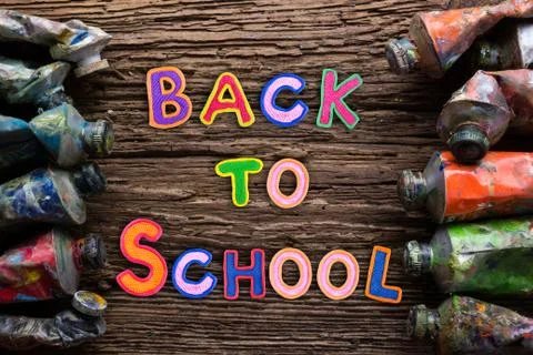 Back to School desk table top view, words on grunge old wooden board background 스톡 사진