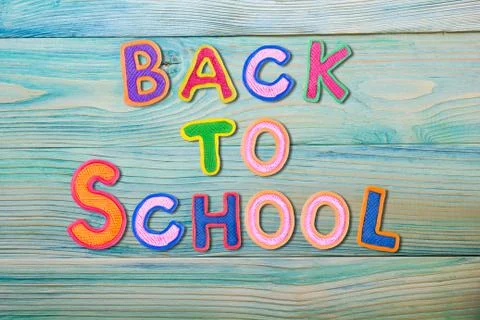 Back to School desk table top view, words on grunge old wooden board background Stock Photos