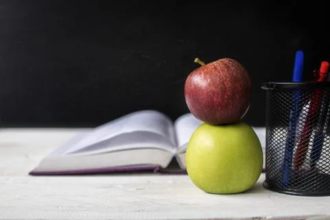 Back to school, education and knowledge concept, apple and note book on tab.. Fotos de archivo