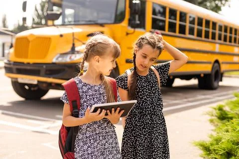 Back to school. First day of school. Two teenage girs at the school feeling Stock Photos