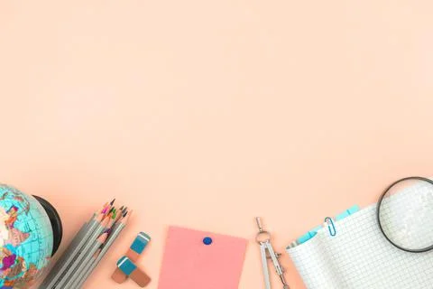 Back to school flat lay pink corner background with copy space and school Stock Photos