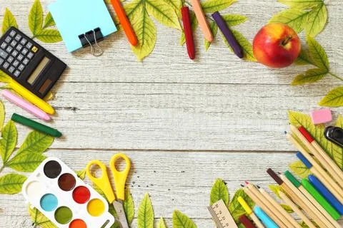 Back to school. Flatlay background. Table with autumn leaves, apple. Stock Photos