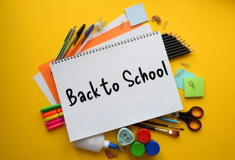 Back to School Handwritten Text on Grid Notebook Surrounded 스톡 사진