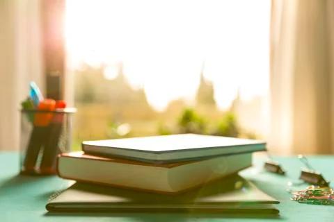 Back to school. Items for the school on a blue wooden table. Stock Photos