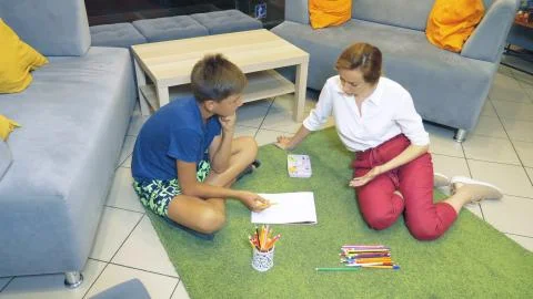 Back to school, learning problems concept. female psychologist conducts a Foto stock