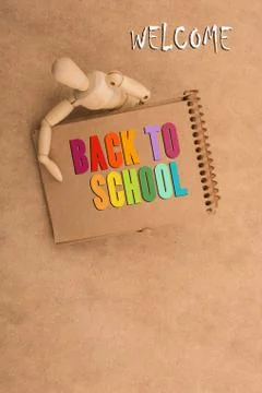 Back to school lettering in arm Stock-Fotos