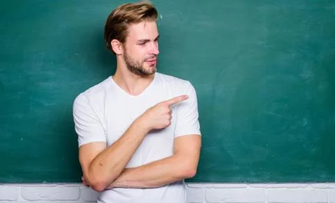 Back to school. Master of simplification. Man teacher in front of chalkboard Stock Photos