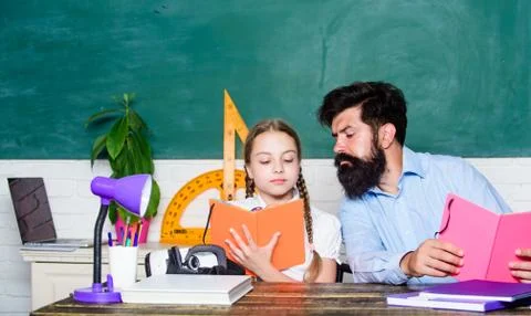Back to school. math geometry. biology chemistry lesson. father and daughter Stock Photos