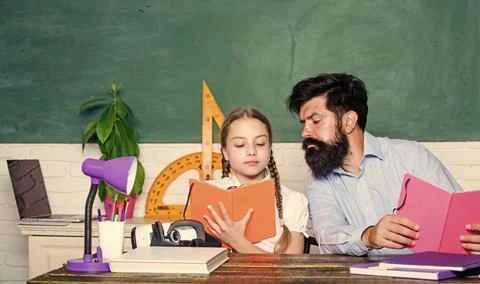 Back to school. math geometry. biology chemistry lesson. father and daughter Stock Photos
