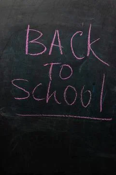 Back to School Message Written in Chalk on a Blackboard for New Academic Year Stock Photos