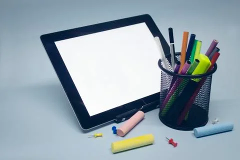 Back to school. Mock up tablet with drawing tools and other stationery on the Stock Photos