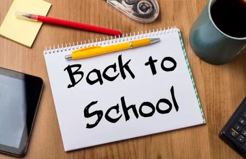 Back to School - Note Pad With Text On Wooden Table Stock Photos