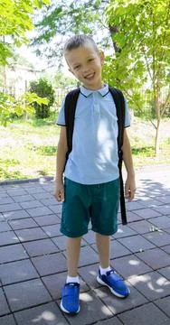 Back to school. Portrait of an elementary school student on the way to study. Stock Photos