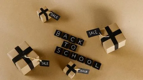 Back to school sale with gift boxes and discount tags Stock Photos