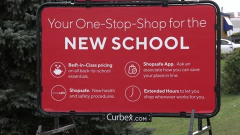 Back to school shopping sign during COVID 19 pandemic Stock Footage 136564742