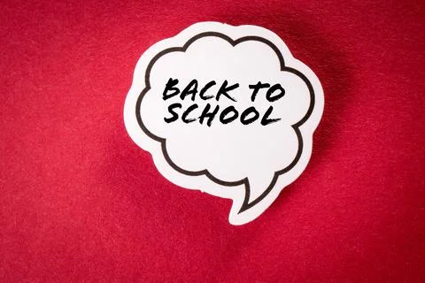 Back to school. Speech bubble with text on red background Stock Photos