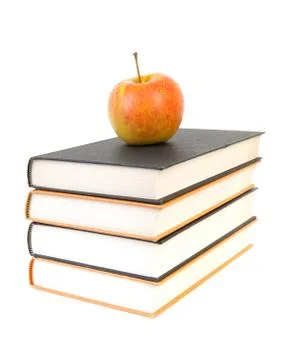 Back to school: stack of books with apple on top Stock Photos