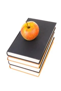 Back to school: stack of books with apple on top Stock Photos