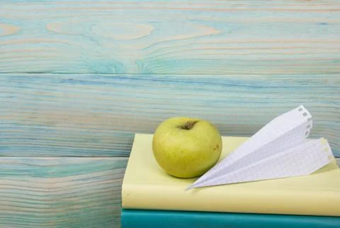 Back to school. Stack of colorful books on wooden table. Copy space Stock Photos