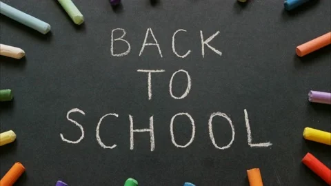 Back to school. Stop motion animation. Black chalkboard with text on it. Stock Footage 159708721