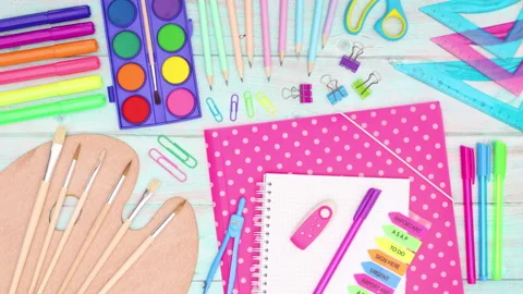 Back to school stop motion. School supplies appear on wooden table Stock-Footage 135949580