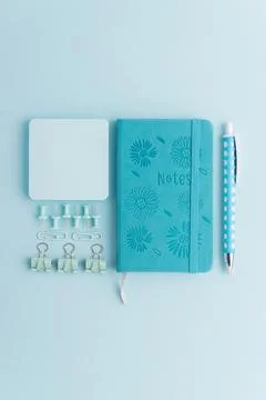 Back to school studying concept with teal stationery Stock Photos