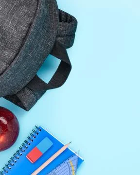 Back to school supplies set backpack apple notebook Stock Photos