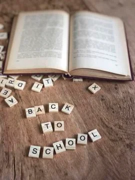 Back to school template with cube letters and book Stock Photos
