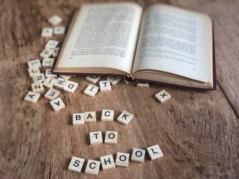 Back to school template with cube letters and book Stock Photos
