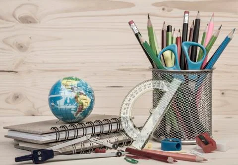 Back to school template with multiple stationery and books on table Stock-Fotos