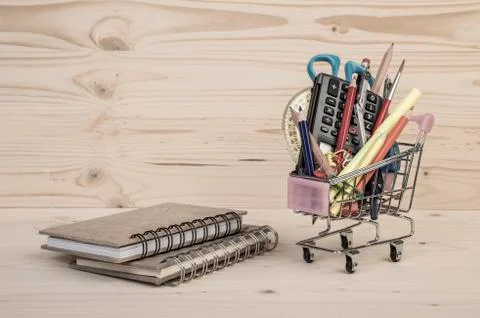 Back to school template with multiple stationery and books on table Stock Photos