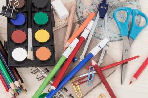 Back to school template with multiple stationery on wooden table Stock Photos