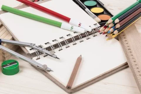 Back to school template with multiple stationery and book on table Stock Photos