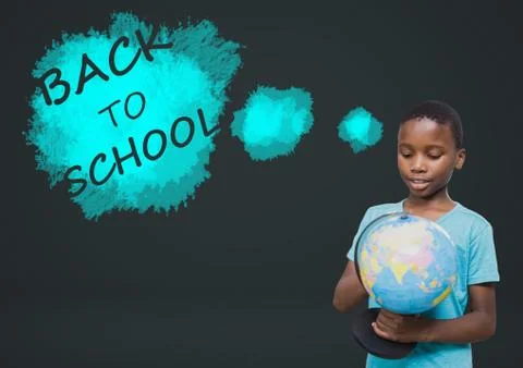 Back to school text and boy holding world globe 写真素材