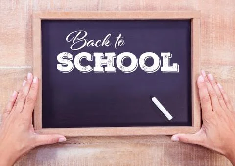 Back to school text on blackboard with chalk Foto stock