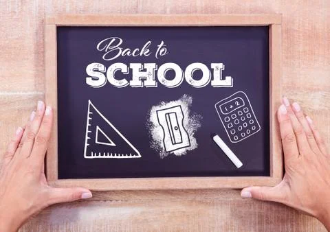 Back to school text on blackboard with chalk and stationery Stock Photos