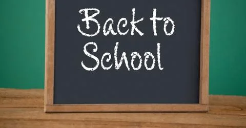 Back to school text on blackboard 스톡 사진