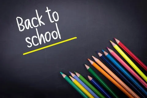 Back to School text on blackboard Stock Photos