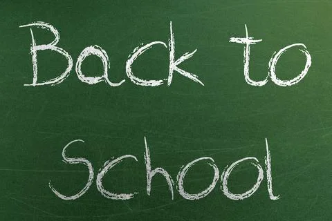 Back to school text on blackboard at school class Stock Photos