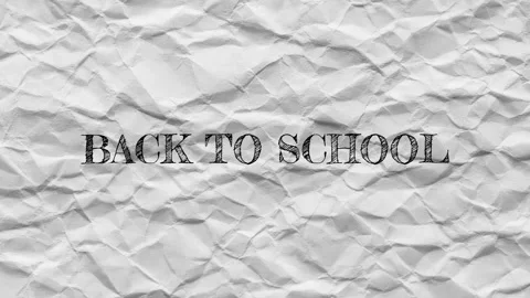Back to School Text on Crumpled Paper Texture Background 4K Stock Footage 332447081