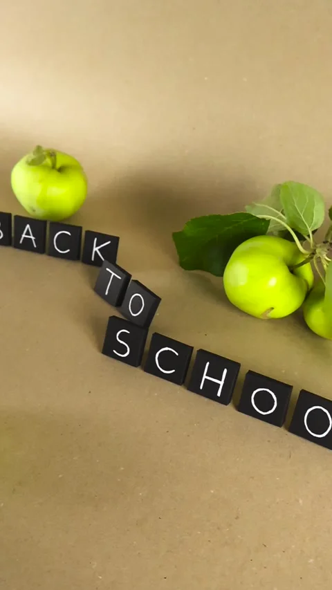 Back to school text message with green apples Stock Footage 341862367