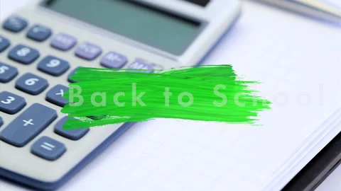 Back To School text over brush stroke against calculator and pen Stock Footage 135680558