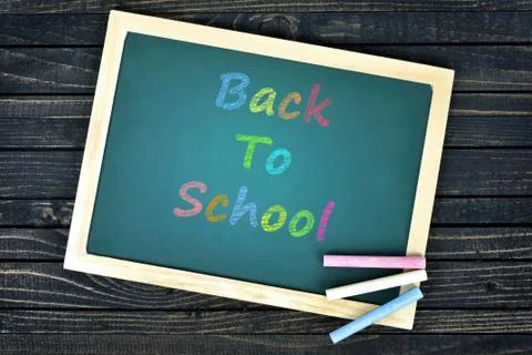 Back to school text on school board 스톡 사진