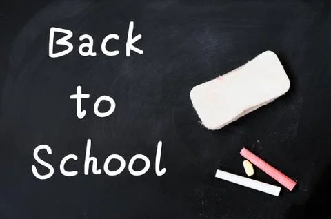 Back to school written on a chalkboard Stock Photos