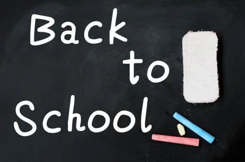Back to school written on a chalkboard Stock Photos