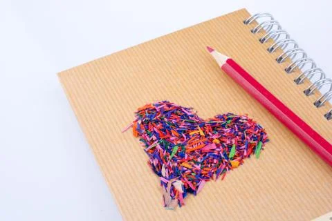 Back to school written title  and a heart shape and color pencil Stock Photos